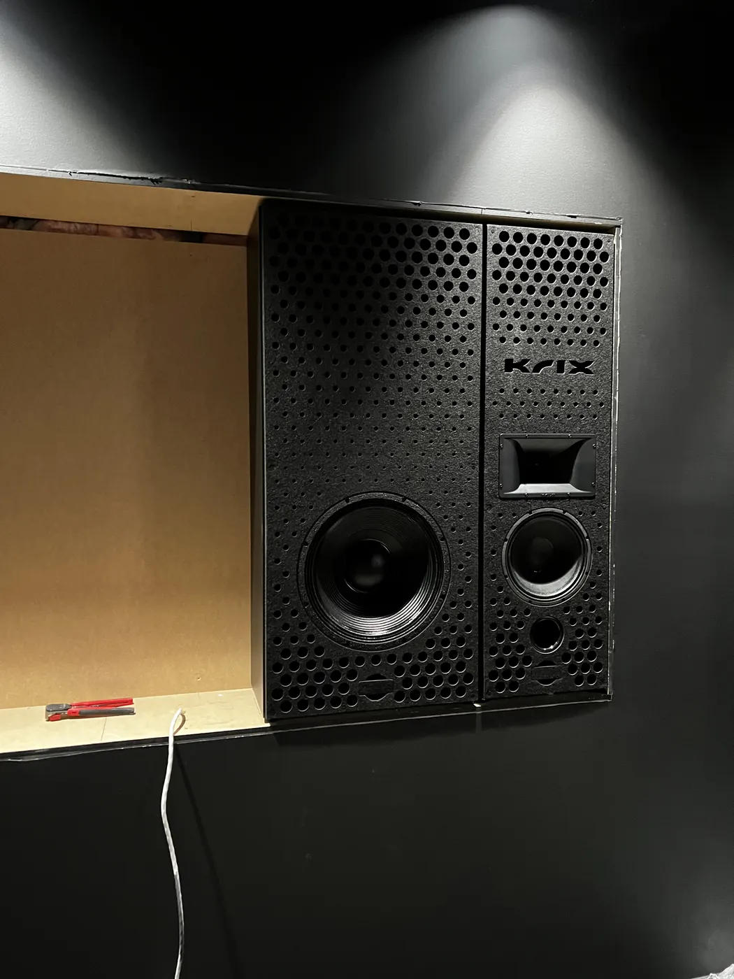 Krix speaker wall under construction before the screen goes in