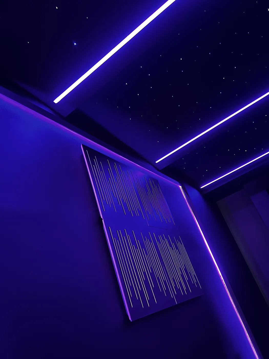 Purple LED light lines over a star ceiling
