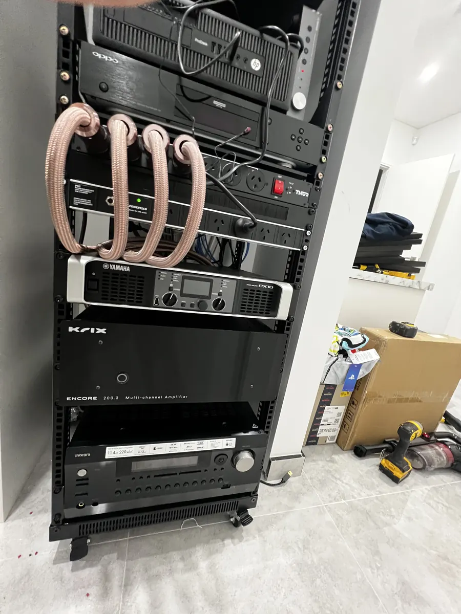 Equipment rack with amplifiers and processor